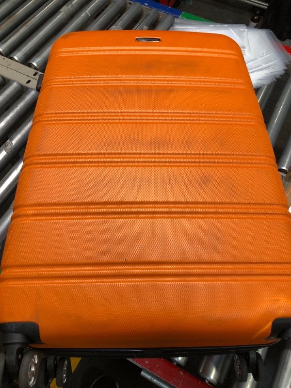 Photo 4 of Rockland Melbourne Hardside Expandable Spinner Wheel Luggage, Orange, Checked-Large 28-Inch Checked-Large 28-Inch Orange*****MISSING WHEEL, SCUFFS.