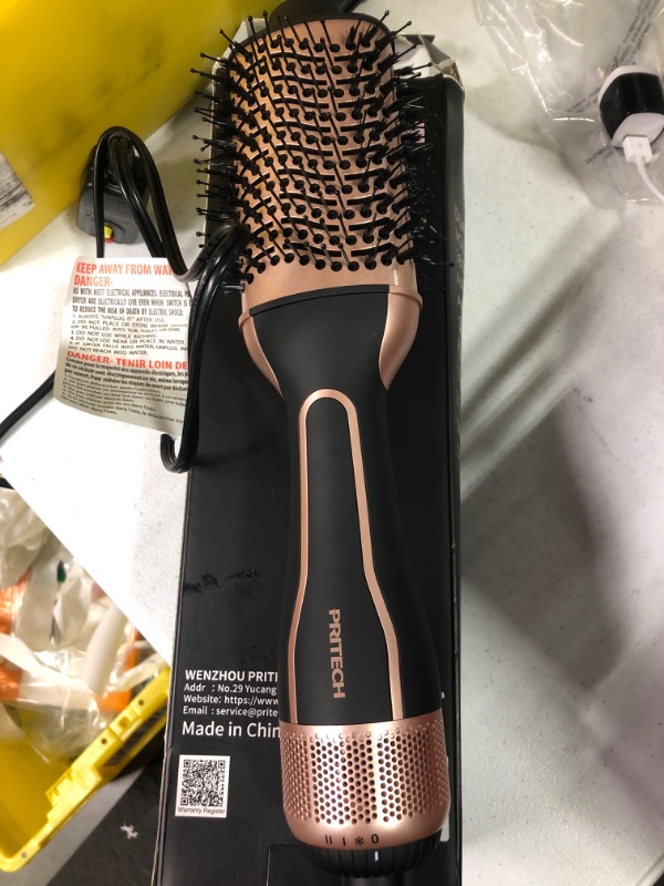 Photo 2 of Dual Voltage Hair Dryer Brush, PRITECH Hot Air Brush 110V-120V/220V-240V Ionic 1000W Blow Dryer Brush 4 in 1 Styler, One Step Volumizer,Styling Brush for Straight and Curling Hair Salon Black