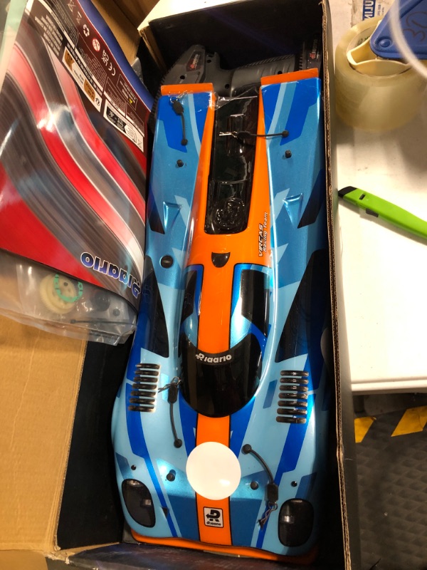 Photo 2 of ***NEEDS NEW BATTERY***

AMORIL 1/10 Fast RC Cars for Adults, Top Speed 60 KM/H On-Road RTR Supercar AK-917 with 80A Brushed ESC,550 13T Motor and 1 * 3300 mah Battery, Cyan&Orange Orange 1:10 Metal Brushed