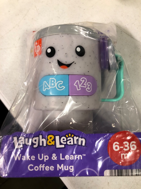 Photo 1 of Fisher-Price Laugh & Learn Baby & Toddler Toy Wake Up & Learn Coffee Mug with Lights Music and Learning Content for Ages 6+ Months