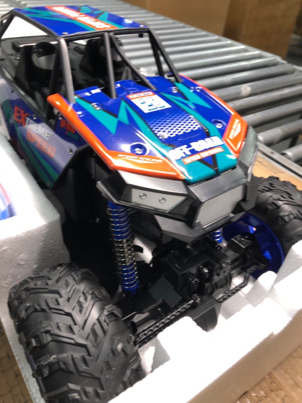 Photo 4 of DEERC DE60 Large 1:8 Scale Upgraded RC Cars Remote Control Car for Adults Boys,Off Road Monster Truck with Realistic Sound,2.4Ghz 4WD Rock Crawler Toy All Terrain Climbing,2 Batteries for 80 Min Play Classic Blue