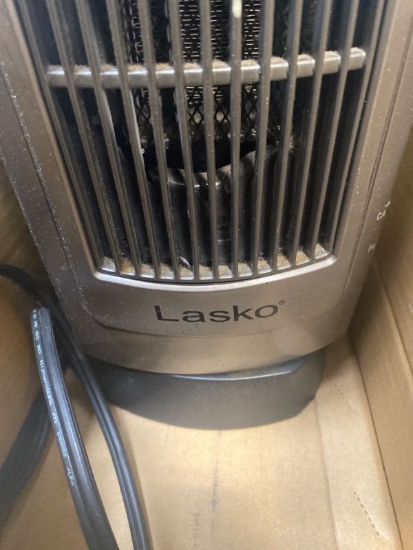 Photo 3 of **USED** Lasko Oscillating Digital Ceramic Tower Heater for Home with Adjustable Thermostat, Timer and Remote Control, 23 Inches, 1500W, Silver, 755320