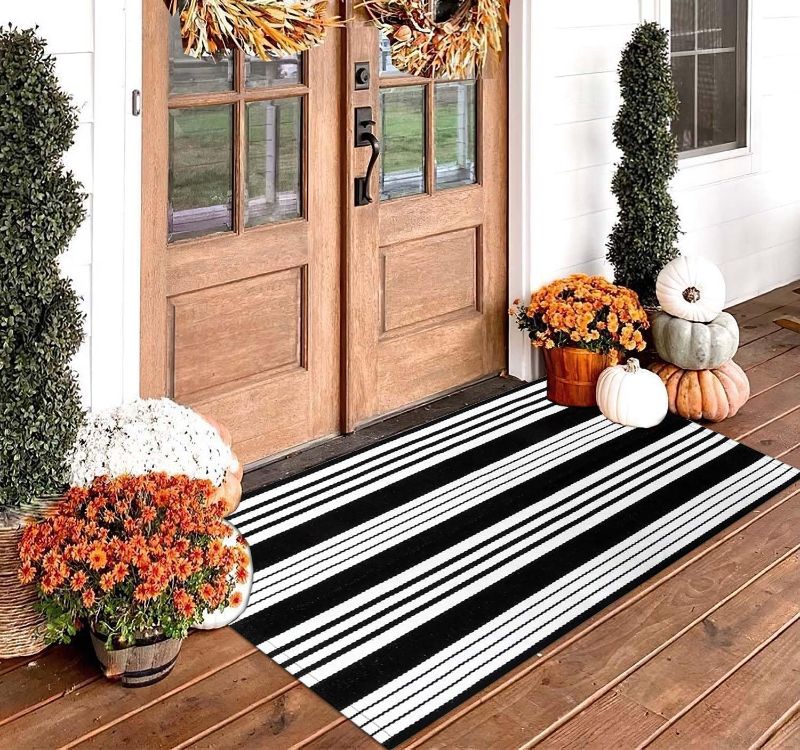 Photo 1 of ** similar to image, not exact***
KaHouen Black and White Striped Rug (52 x 23 Inches),Black and White Outdoor Rug, Hand-Woven Striped Rug Indoor/Outdoor Area Rug Front Door Floor Mat for...
