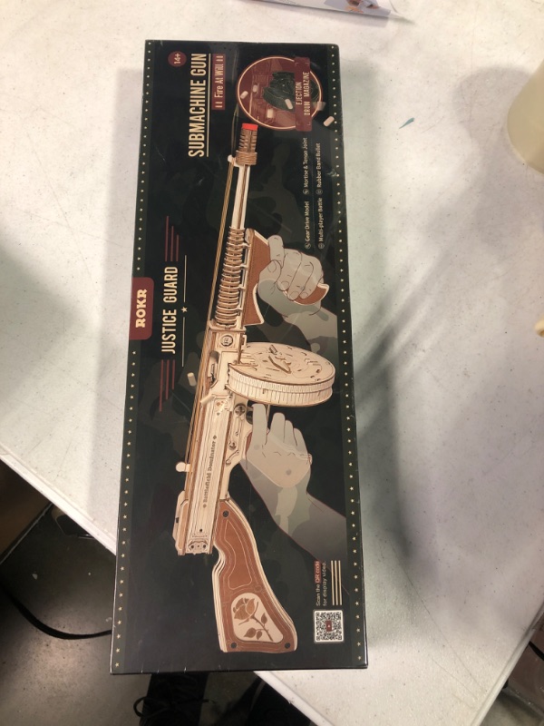 Photo 1 of RoWood 3D Puzzle Tommy Rubber Band Gun Model Kits Wooden Puzzles for Adults Wood Building Kits Unique Gifts for Adults&Teens