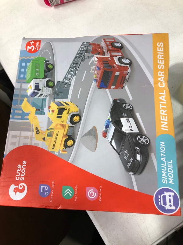 Photo 2 of 4 Pack Fire Truck, Construction Truck, Police Car and Garbage Truck with Sound and Light, Pull Back Cars Push and Go Cars Friction Powered Play Vehicles for Toddler Boys and Girls