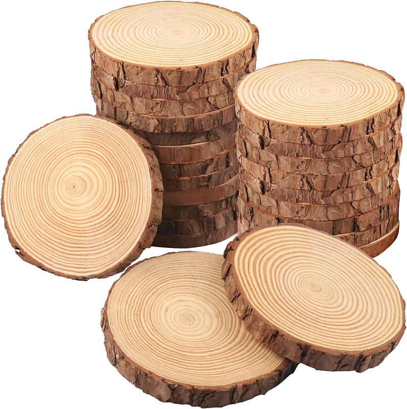 Photo 1 of 24 PCS 5.5-6.3 Inch Natural Wood Slices, Unfinished Pine Wood Circles with Barks for Coasters, DIY Crafts, Christmas Rustic Wedding Ornaments and Centerpieces,by GNIEMCKIN
