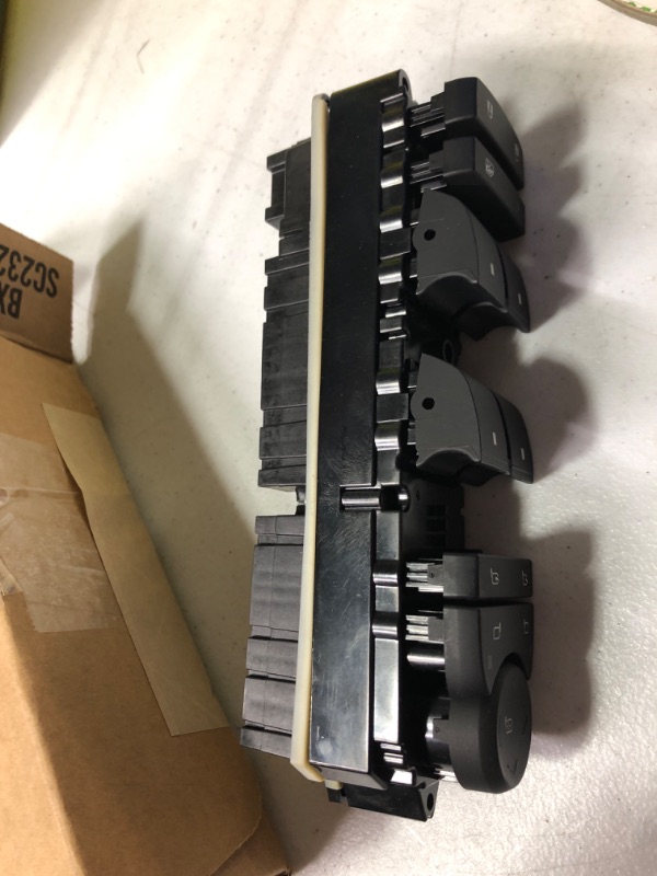 Photo 1 of General Motors GM Genuine Parts 20835553 Driver Side Door Lock, Mirror, and Window Switch