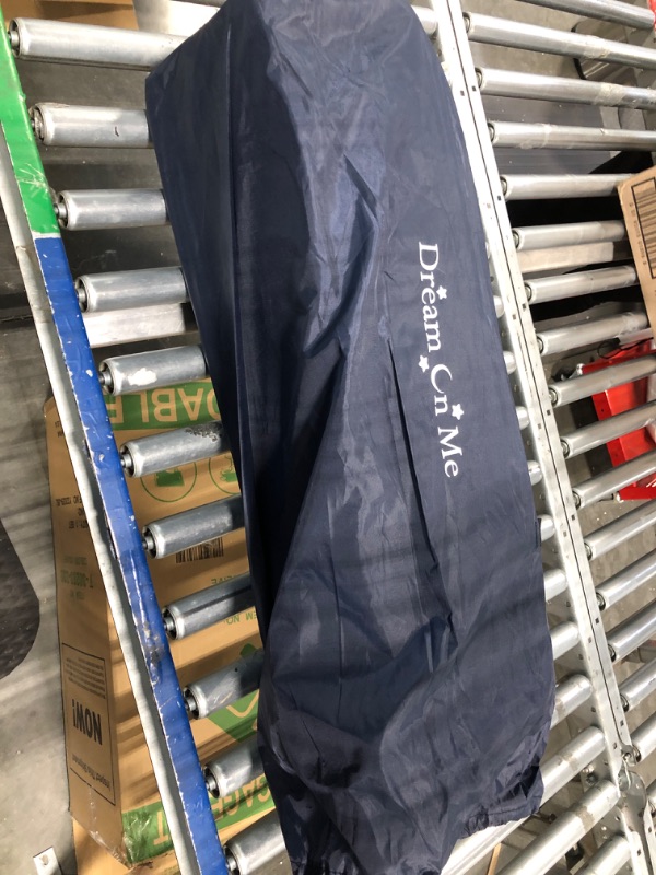 Photo 1 of Dream On Me Zodiak Portable Playard in Navy, Lightweight, Packable and Easy Setup Baby Playard, Breathable Mesh Sides and Soft Fabric - Comes with a Removable Padded Mat Navy Small (Pack of 1)