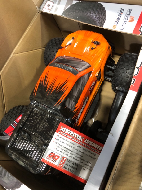 Photo 3 of ARRMA RC Truck 1/10 Granite 4X2 Boost MEGA 550 Brushed Monster Truck RTR with Battery & Charger, Orange, ARA4102SV4T1