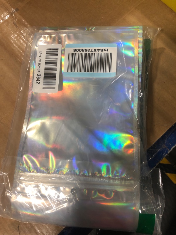 Photo 2 of 100PCS Holographic Mylar Bags, Smell Proof Bag for Business, Foil Pouch Ziplock Bags for Party Favor Food Storage (6x9 Inch)
