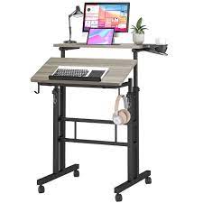 Photo 1 of Klvied Stand Up Desk on Wheels, Portable Computer Desk for Home Office,Rolling Desk for Laptop with Removable Cup Holder, Adjustable Laptop Cart for Standing or Sitting,Gray Oak