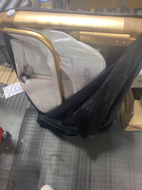 Photo 1 of KoolerThings Baby Bassinet, Bedside Sleeper for Baby, Easy Folding Portable Crib with Storage Basket for Newborn, Bedside Bassinet, Comfy Mattress/Travel Bag Included (White and Gold)
