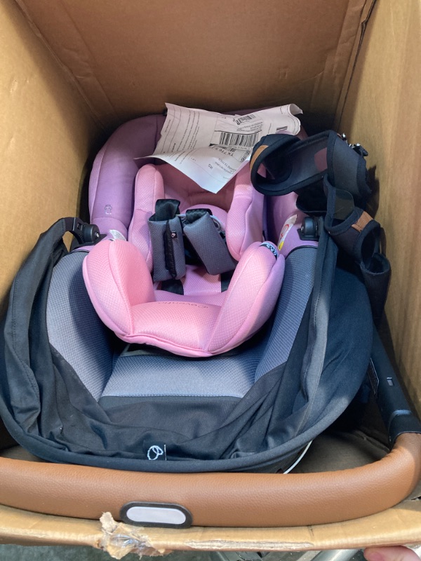 Photo 1 of Evenflo Gold Shyft DualRide with Carryall Storage Infant Car Seat and Stroller Combo (Opal Pink) Gold Shyft DualRide Opal Pink