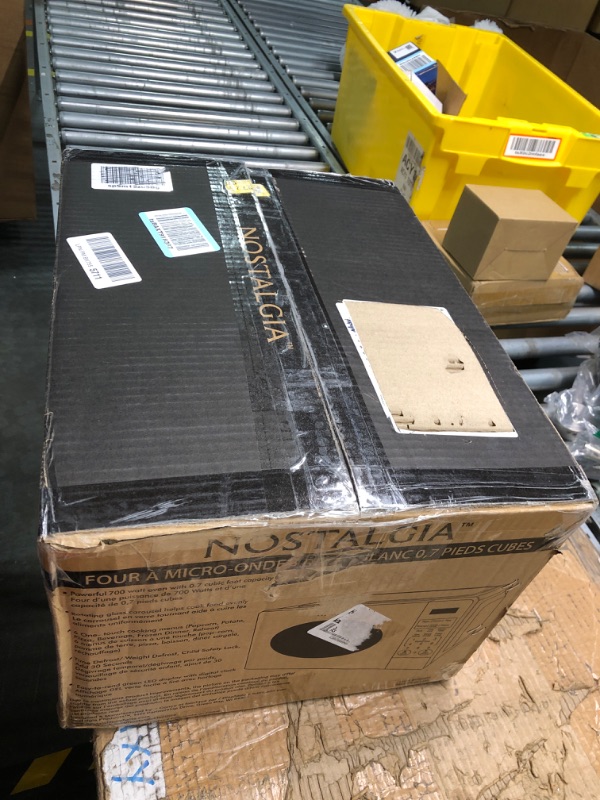 Photo 1 of Nostalgia Modern Retro Countertop Microwave Oven - 700-Watt - 0.7 cu ft - 12 Pre-Programmed Cooking Settings - Digital Clock - Kitchen Appliances - White Modern Retro 0.7 Cu. Ft. White