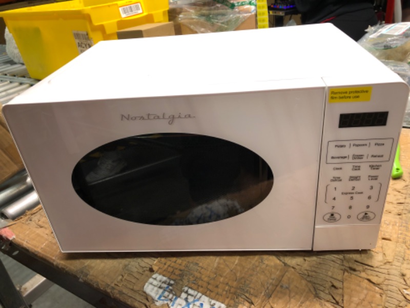 Photo 1 of Nostalgia Modern Retro Countertop Microwave Oven - 700-Watt - 0.7 cu ft - 12 Pre-Programmed Cooking Settings - Digital Clock - Kitchen Appliances - White Modern Retro 0.7 Cu. Ft. White