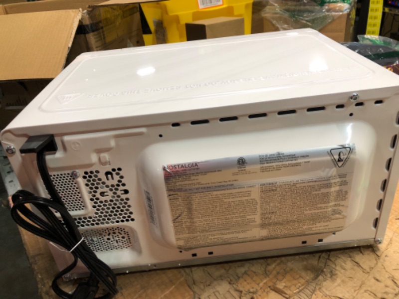 Photo 1 of Nostalgia Modern Retro Countertop Microwave Oven - 700-Watt - 0.7 cu ft - 12 Pre-Programmed Cooking Settings - Digital Clock - Kitchen Appliances - White Modern Retro 0.7 Cu. Ft. White