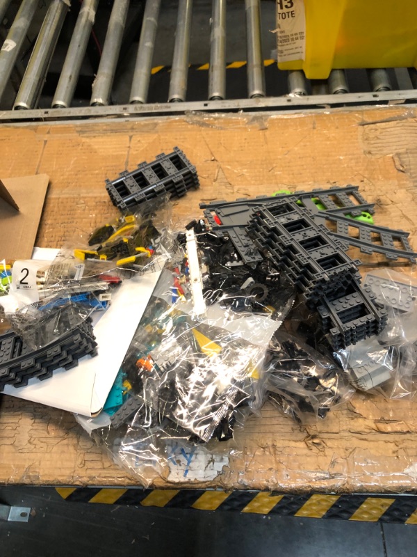 Photo 1 of LEGO City Freight Train Set, 60336 Remote Control Toy for Kids Aged 7 Plus with Sounds, 2 Wagons, Car Transporter, 33 Track Pieces and 2 EV Car Toys ***PARTS MAY BE MISSING***