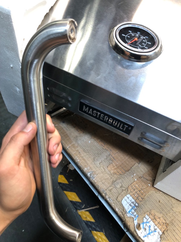 Photo 1 of ****USED**** 
Masterbuilt MB20030819 Portable Propane Grill, Stainless Steel New Version Propane Grill USED