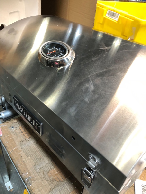 Photo 1 of ****USED**** 
Masterbuilt MB20030819 Portable Propane Grill, Stainless Steel New Version Propane Grill USED