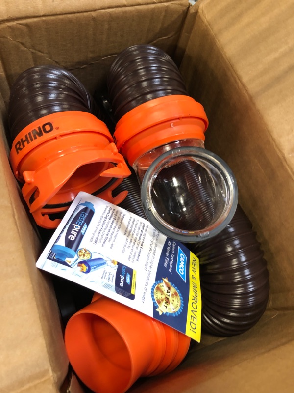 Photo 3 of Camco RhinoFLEX RV Sewer Hose Kit with Swivel Transparent Elbow and 4-in-1 Dump Station Fitting, Brown, 15 Feet (39770) 15ft Sewer Hose Kit Frustration-Free Packaging