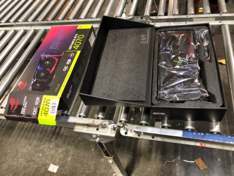 Photo 1 of ASUS ROG Strix GeForce RTX™ 4070 OC Edition Gaming Graphics Card (PCIe 4.0, 12GB GDDR6X, DLSS 3, HDMI 2.1, DisplayPort 1.4a) Overclocking ROG Strix RTX4070|OC