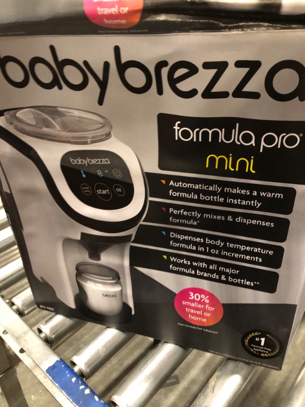 Photo 1 of Baby Brezza Formula Pro Mini Baby Formula Mixer Machine Fits Small Spaces and is Portable for Travel– Bottle Makers Makes The Perfect Bottle for Your Infant On The Go, White
