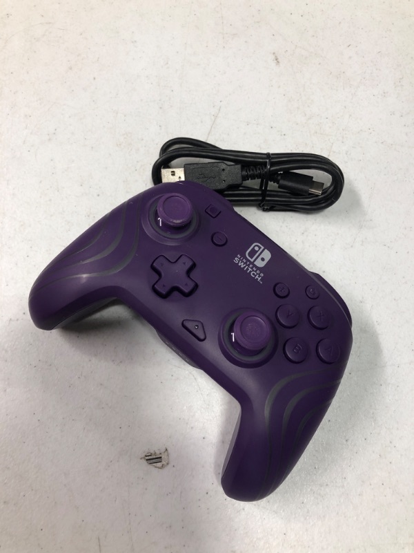 Photo 3 of PDP Afterglow™ Wave Enhanced Wireless Nintendo Switch Pro Controller, 8 Colors RGB LED, Dual Programmable Gaming Buttons, 40 Hour Rechargeable Battery Power, 30 Foot Connection, Officially Licensed by Nintendo: Purple Wireless Wave Purple