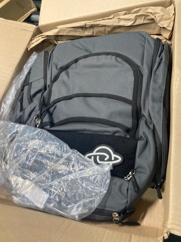 Photo 1 of Discology Disc Golf OG V2 Grey & Black Disc Golf Bag | 26+ Disc Capacity | Premium Disc Golf Backpack Bag | Tough, Durable Design | 2 Large Side Compartments | Two Patches Included - Flag Patch Not Included
