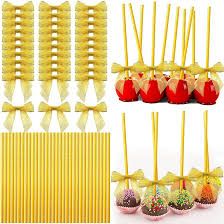 Photo 1 of 200 Cake Pop Sticks and Bows Kit for Cake Pops, Candies, Lollipops, Chocolates and Cookies Decorating, Include 100 Satin Ribbon Twist Tie Bows and 100 Paper Striped Straws for Party Supplies (Gold)