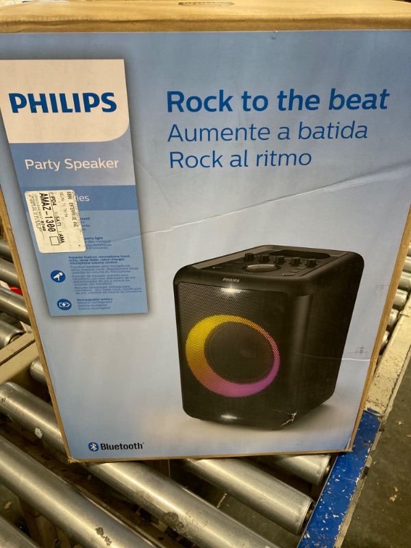 Photo 2 of ***MISSING ADAPTER//USED***  
Philips X3206 Bluetooth Party Speaker with Deep bass, Up to 14 Hours Battery, Party Lights and Karaoke Effects, Microphone and Guitar Input, Audio-in, USB Charging, Built-in Trolley, TAX3206 With light effects Medium
