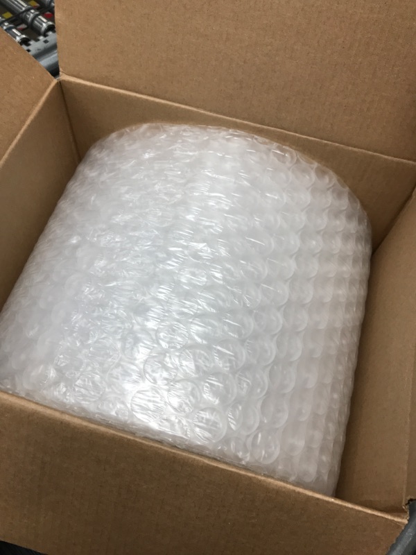 Photo 2 of Duck Brand Large Bubble Wrap Cushioning, 5/16" Bubbles for Extra Protection Packing, Shipping, and Moving, Perforated Every 12", 12" x 60' per Roll 12 in. x 60 ft.