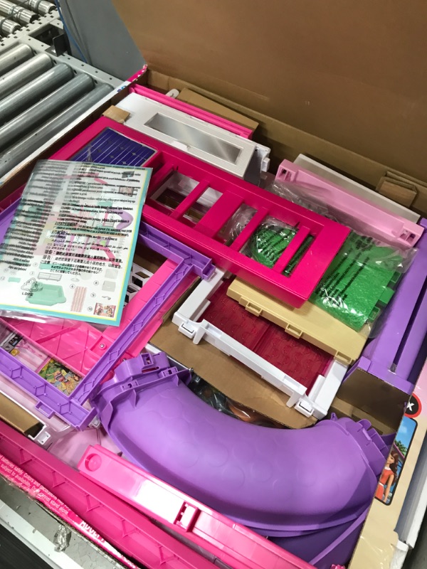 Photo 1 of Barbie DreamHouse Dollhouse with 70+ Accessories, Working Elevator & Slide, Transforming Furniture, Lights & Sounds Wheelchair Accessible Elevator