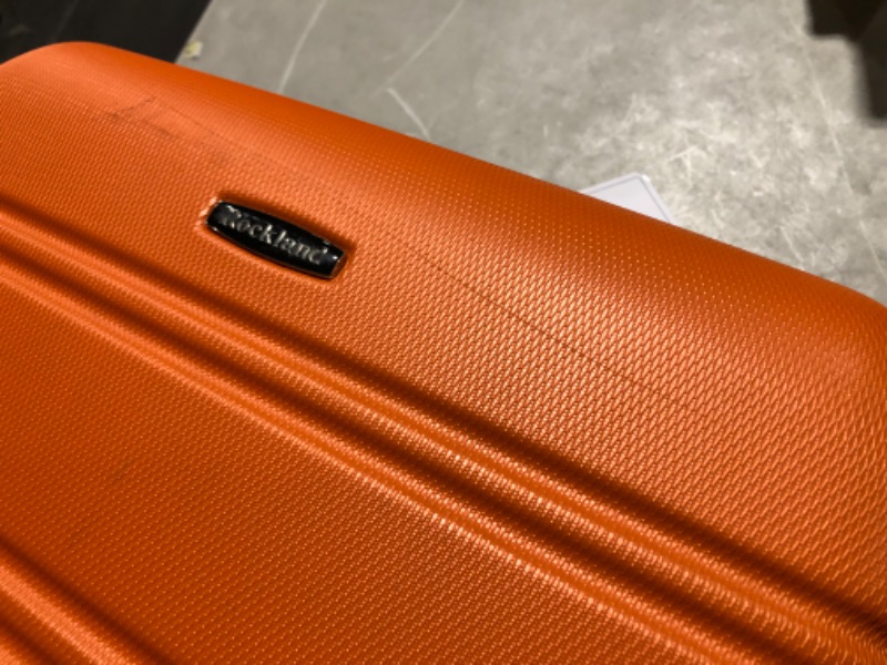 Photo 7 of ***MAJOR DAMAGE - SEE COMMENTS***
Rockland Melbourne Hardside Expandable Spinner Wheel Luggage, Orange, Checked-Large 28-Inch