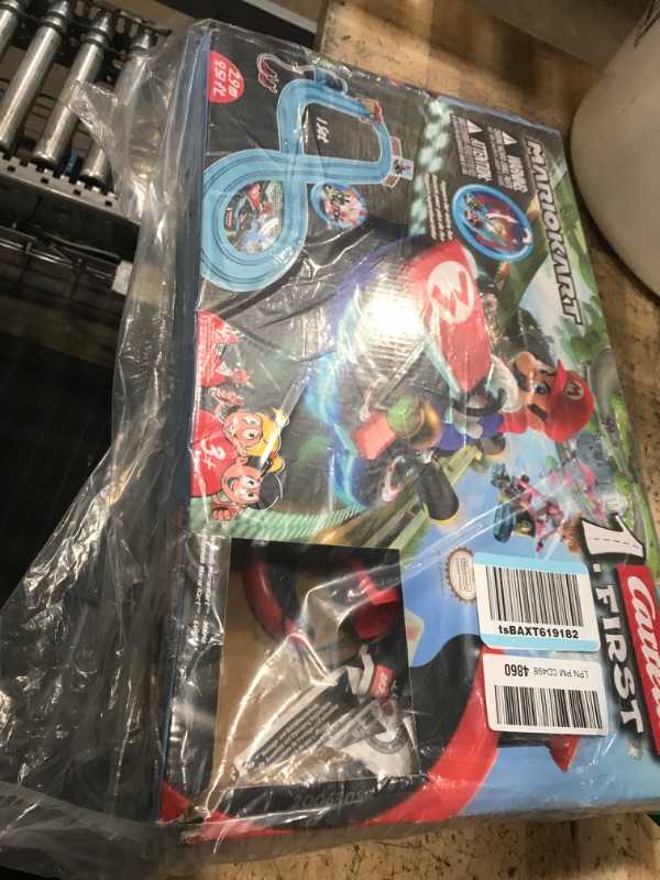 Photo 2 of Carrera First Nintendo Mario Kart Slot Car Race Track - Includes 2 Cars: Mario and Luigi and Two-Controllers - Battery-Powered Beginner Set for Kids Ages 3 Years and Up, 20063028 Mario Kart / Flippers