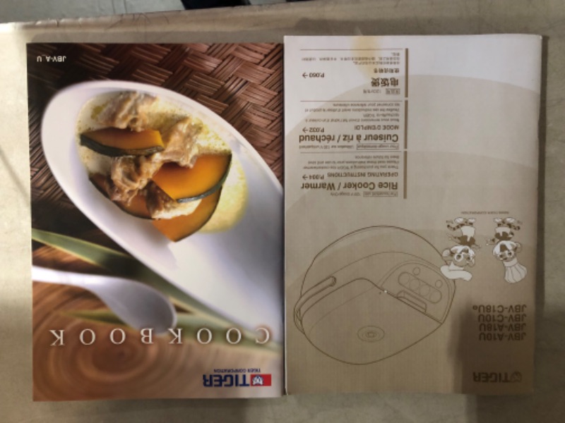 Photo 1 of ***MISSING INNER POT***
TIGER JBV-A10U 5.5-Cup (Uncooked) Micom Rice Cooker with Food Steamer Basket, White
