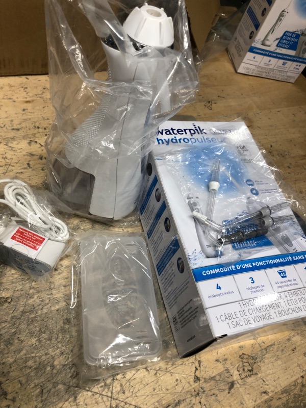 Photo 2 of **BOX WAS OPEND BUT APPEARS NEW**
Waterpik Cordless Advanced Water Flosser For Teeth, Gums, Braces, Dental Care With Travel Bag and 4 Tips, ADA Accepted, Rechargeable, Portable, and Waterproof, White WP-580 White Water Flosser