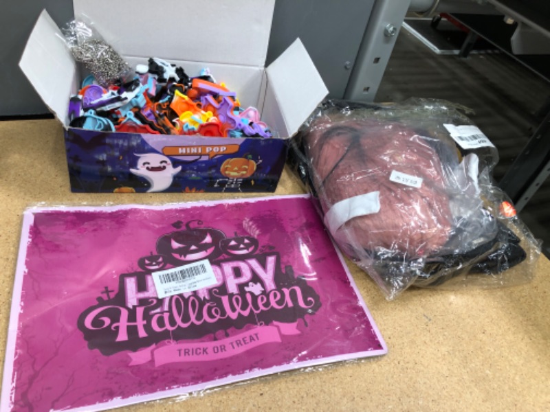 Photo 1 of 3 HALLOWEEN ITEMS: MINI POP ITS, SIGN, AND COSTUME( SIZE XL)