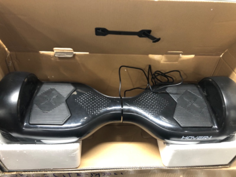 Photo 2 of ***SEE NOTE*** Hover-1 Helix Electric Hoverboard | 7MPH Top Speed, 4 Mile Range, 6HR Full-Charge, Built-in Bluetooth Speaker, Rider Modes: Beginner to Expert Hoverboard Black