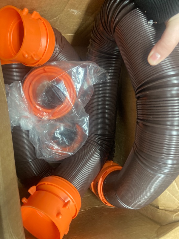 Photo 2 of Camco 20' (39742) RhinoFLEX 20-Foot RV Sewer Hose Kit, Swivel Transparent Elbow with 4-in-1 Dump Station Fitting-Storage Caps Included , Black , Brown 20ft Sewer Hose Kit Frustration-Free Packaging