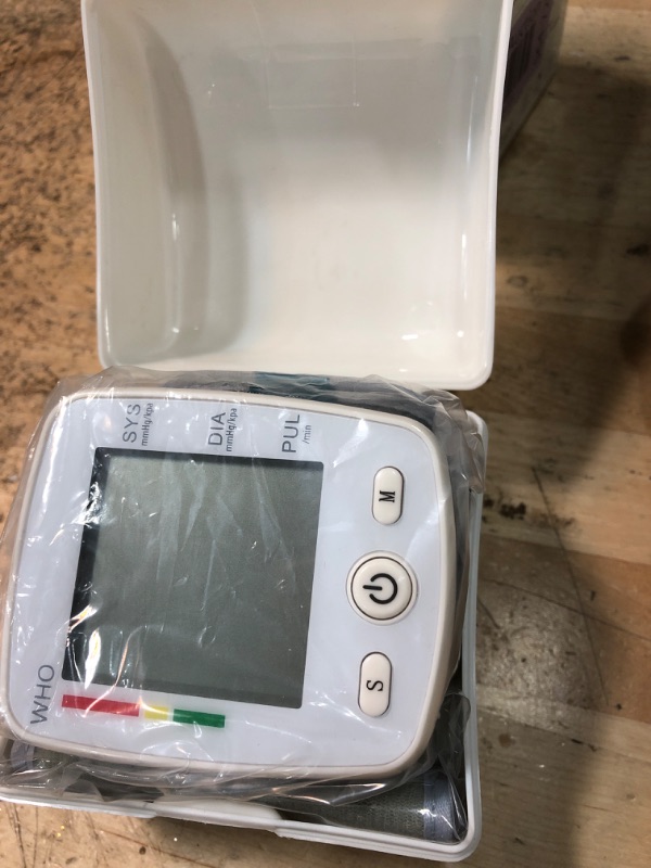 Photo 2 of COLOR WHITE 
potulas Blood Pressure Monitor, Wrist Blood Pressure Cuff Monitor with USB Charging, Automatic Digital BP Machine,Voice Broadcast, Large Display Screen