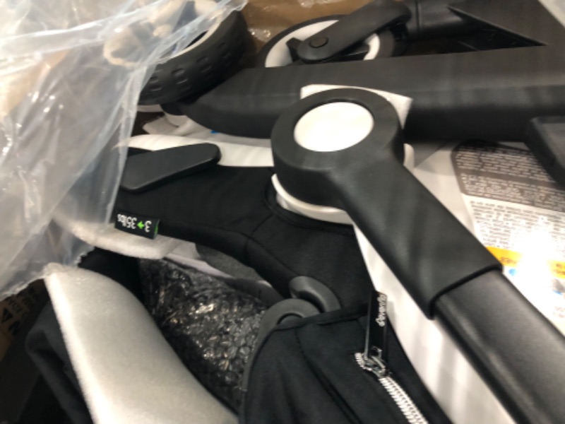 Photo 1 of Evenflo Gold Shyft DualRide Infant Car Seat and Stroller Combo with Carryall Storage (Moonstone Gray) Gold Shyft DualRide Moonstone Gray