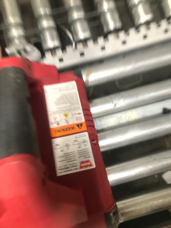Photo 1 of **KREAD NOTES DAMAGED BATTER**
WARN 885005 PullzAll Cordless 24V DC Portable Electric Winch with Steel Cable and 2 Rechargeable Battery Packs: 1/2 Ton (1,000 lb) Pulling Capacity, red

