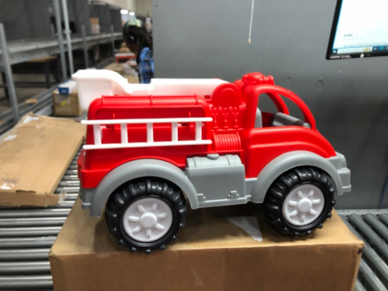 Photo 1 of American Plastic Toys Kids’ Red Gigantic Fire Truck, Removal Ladder, Extendable Bucket, Large Knobby Wheels, Fit for Indoors & Outdoors, for Ages 2+