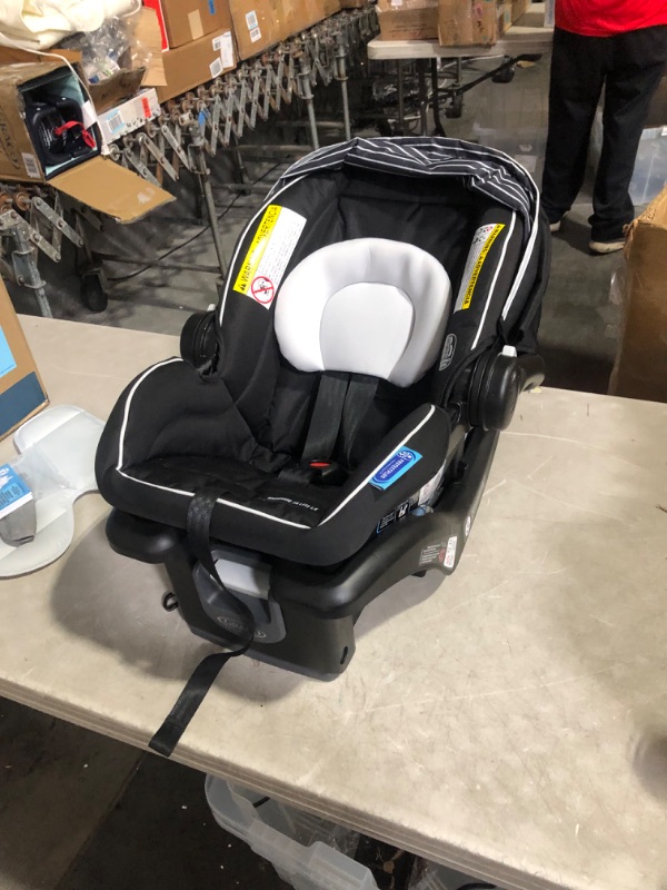 Photo 2 of ***USED - LIKELY MISSING PARTS***
Graco SnugRide 35 Lite LX Infant Car Seat, Studio