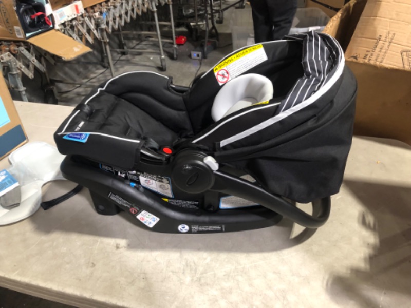 Photo 4 of ***USED - LIKELY MISSING PARTS***
Graco SnugRide 35 Lite LX Infant Car Seat, Studio