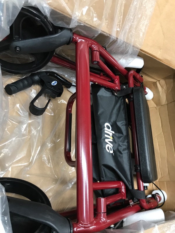 Photo 3 of ***USED - LIKELY MISSING PARTS - UNABLE TO VERIFY FUNCTIONALITY***
Drive Medical 795BU Duet Folding Transport Wheelchair and Rollator Walker, Burgundy