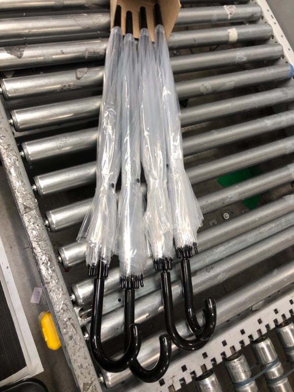 Photo 1 of Pack of 4 Clear Plastic Umbrellas