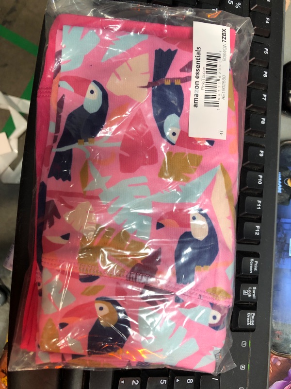 Photo 1 of AMAZON ESSENTIALS KIDS  PINK TOUCAN LEGGINGS 2PK 4T