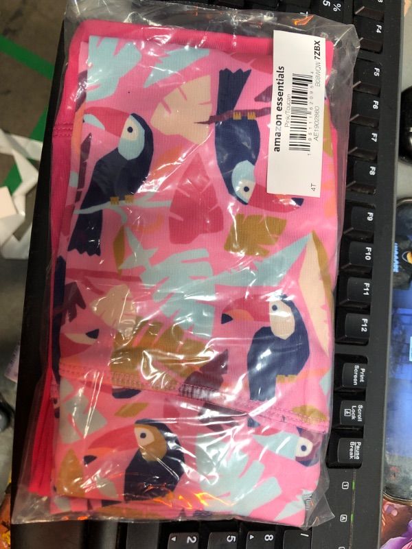 Photo 1 of AMAZON ESSENTIALS KIDS  PINK TOUCAN LEGGINGS 2PK  4T