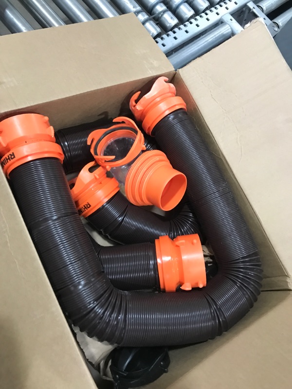 Photo 2 of ??Camco RhinoFLEX 20' Camper/RV Sewer Hose Kit - Includes 4-in-1 Adapter, Clear Elbow, & Caps - Connects to 3? Slip & 3?, 3 1/2?, 4? NPT Threaded Sewer Connections (39742)
